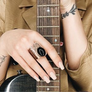 Copper ring with black gem